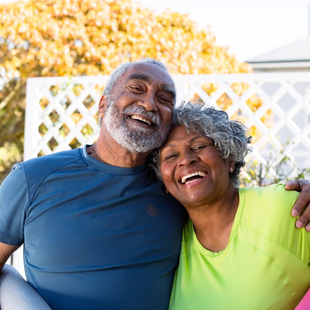 smiling-african-american-senior-couple-holding-yog-2023-11-27-05-05-37-utc-min